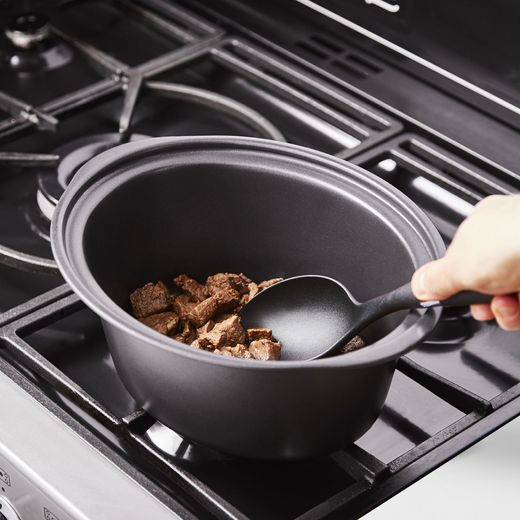 Morphy Richards 460022 Slow Cooker - Titanium - Person cooking in pot shot