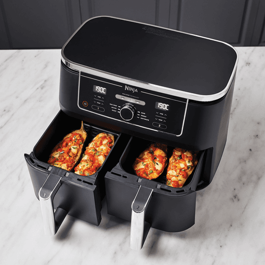 Ninja Foodi Max Dual Zone AF400UK Air Fryer - Black - Ninja in kitchen cooking food shot