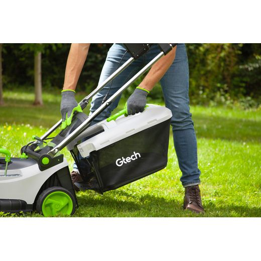 Gtech 1-05-020 Lawn Mower Green / White - man using lawnmower shot