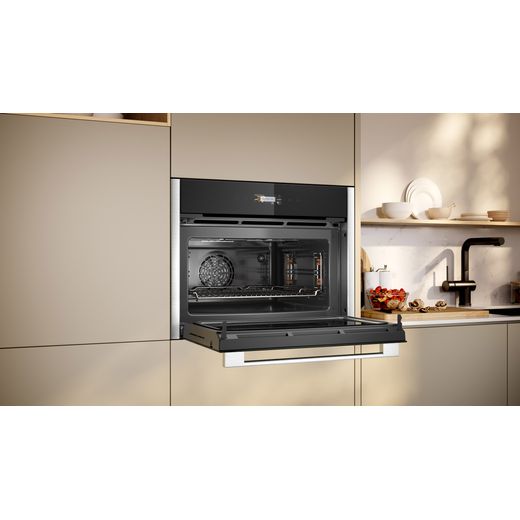 NEFF Compact Electric Single Oven - Black / Stainless Steel - Oven in kitchen with door open shot