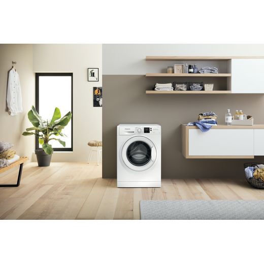 Hotpoint Anti-Stain NSWM 846 W UK 8kg Washing Machine with 1400 rpm - White - Washing machine in utility room shot