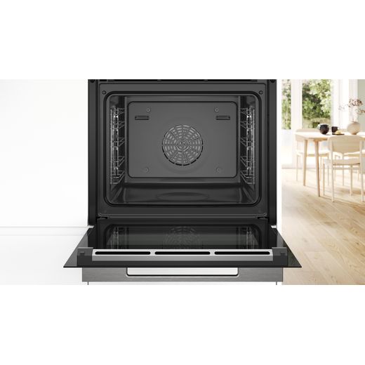 Bosch Serie 8 Electric Single Oven - Black - Oven in kitchen with door open showing cavity shot