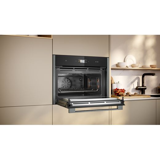 NEFF N90 Compact Electric Single Oven - Graphite - Oven in kitchen with door open shot