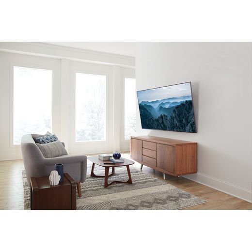 Sanus VLT7-B2 TV Wall Bracket For inch TV's - Tv brakcet on wall holding tv in living room shot