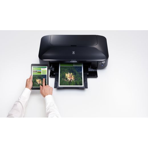 Canon 8747B008 Printer Black - Person using phone to connect to printer shot