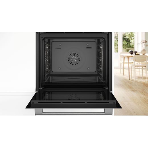 Bosch Series 4 Built In Electric Single Oven - White - Oven with door open in kitchen shot