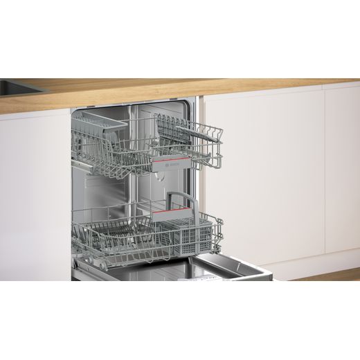 Bosch Series 4 Integrated Standard Dishwasher - Stainless Steel - Dishwasher with door open in kitchen shot