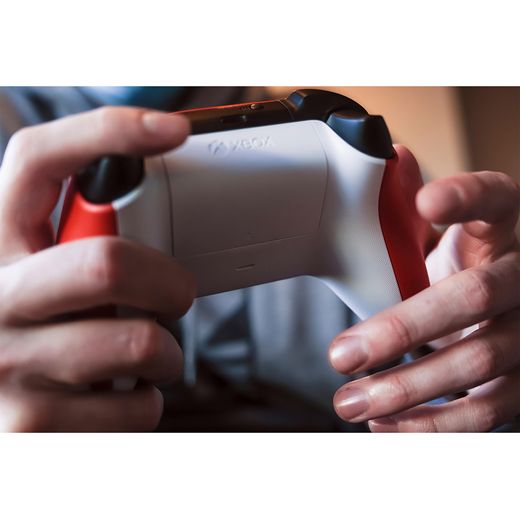 Xbox V2 Wireless Gaming Controller For Android,PC,Xbox One,Xbox One S,Xbox One X,Xbox Series S,Xbox Series X,iOS - Pulse Red - Person using controller
