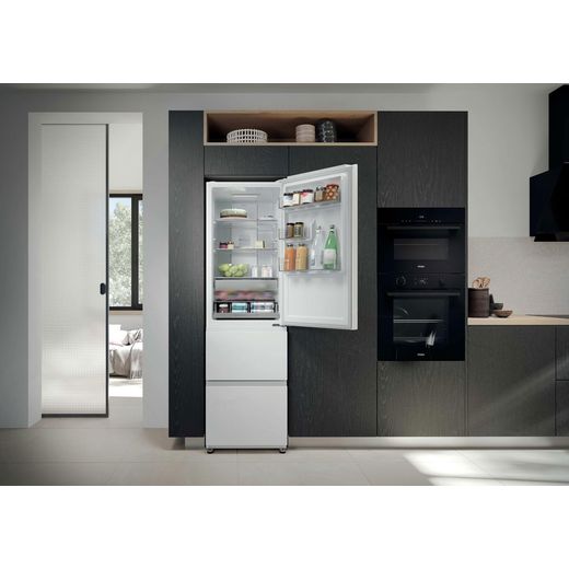 Haier 3D 55 Series 3 HTR3518ENMWK 185cm High 60/40 No Frost Fridge Freezer - White - Fridge freezer in kitchen with door open shot