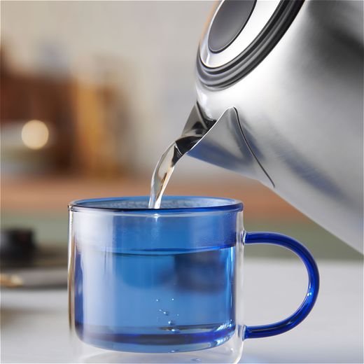 Russell Hobbs Quiet Boil 20460 Kettle - Stainless Steel - Water pouring into mug shot