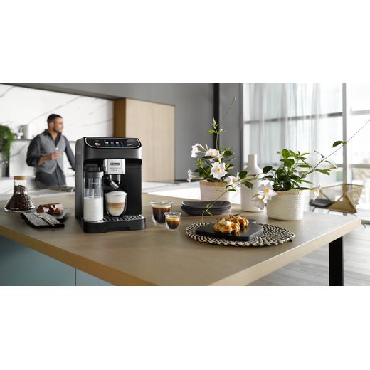 De'Longhi Magnifica Plus ECAM320.60.B Bean to Cup Coffee Machine - Black - Coffee machine on kitchen counter with food shot