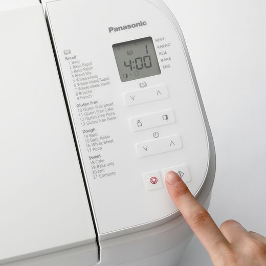 Panasonic Bread Maker - White - person using control panel shot 