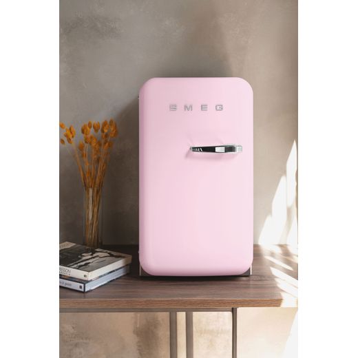 Smeg 50s Style Right Hand Hinged Minibar FAB5RPK6 72cm High Fridge - Pink - Fridge on table shot