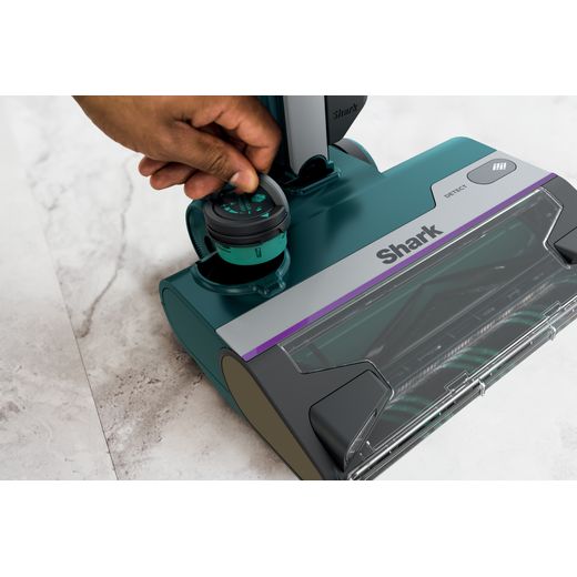 Shark HZ4000UKT Wet & Dry Cleaner - Teal - Person adding odour filter shot