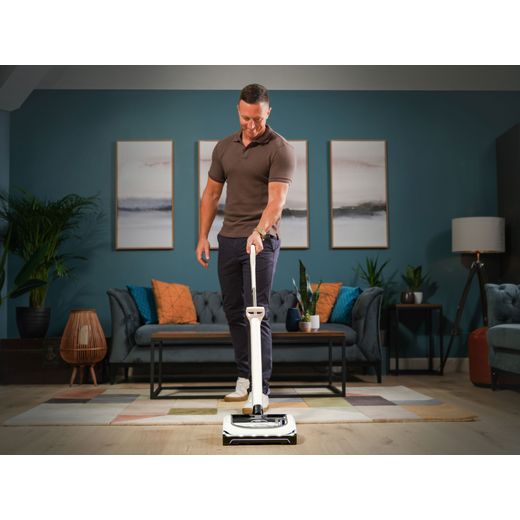 Gtech AirRam Platinum 1-03-273 Cordless Vacuum Cleaner with up to 60 Minutes Run Time - Silver - Man hoovering floor shot