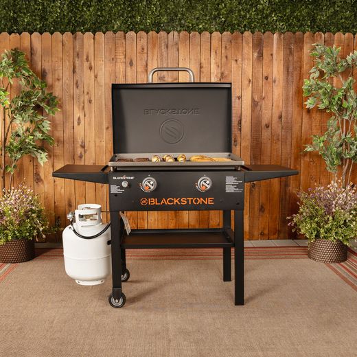 Blackstone 28in Griddle with Hood Gas Barbecue - Black - BBQ in kitchen  shot