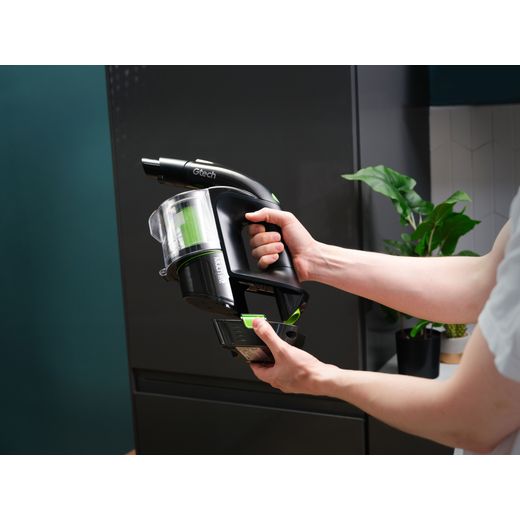 Gtech Multi K9 1-03-195 Cordless Vacuum Cleaner with up to 20 Minutes Run Time - pixel - Man changing battery shot