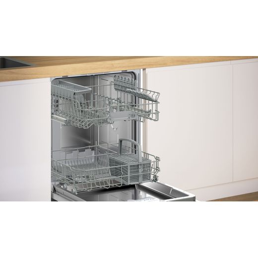 Bosch Integrated Standard Dishwasher - White - Close up dishwasher open in kitchen shot