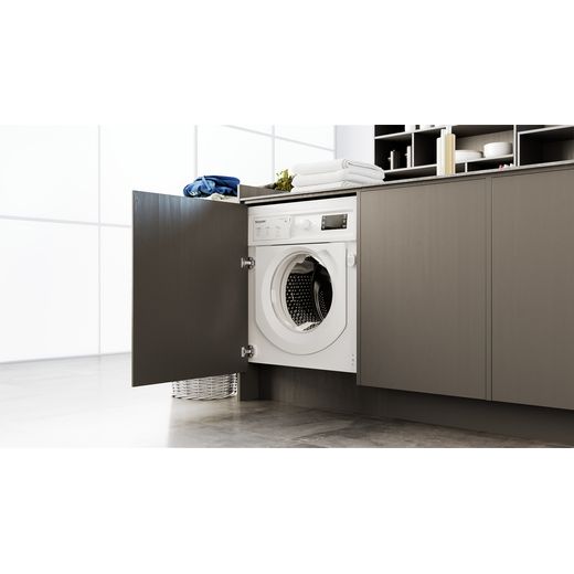 Hotpoint BI WMHG 91485 UK 9kg Washing Machine with 1400 rpm - White - Washing machine in cupboard in kitchen shot 