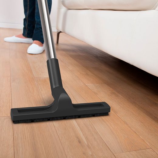 Henry Xtra HVX160-11 Cylinder Vacuum Cleaner - person cleaning floor shot