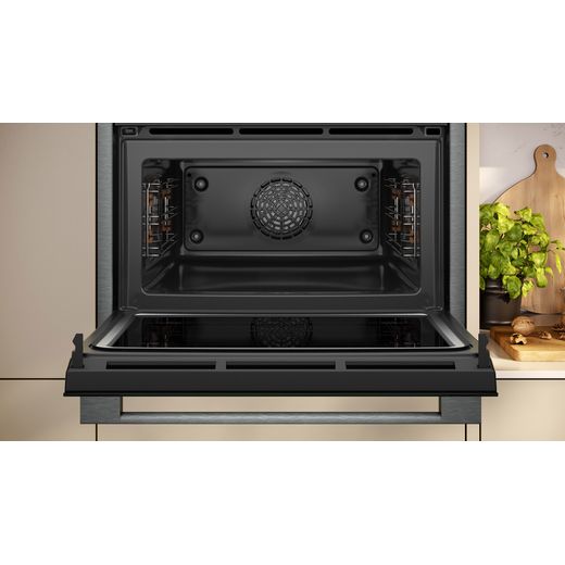 NEFF Compact Electric Single Oven - Graphite - Oven in kitchen with door open shot
