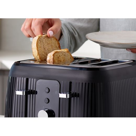 Kenwood Dawn TFP09.000BK 4 Slice Toaster - Black - Person getting toast out of toaster shot
