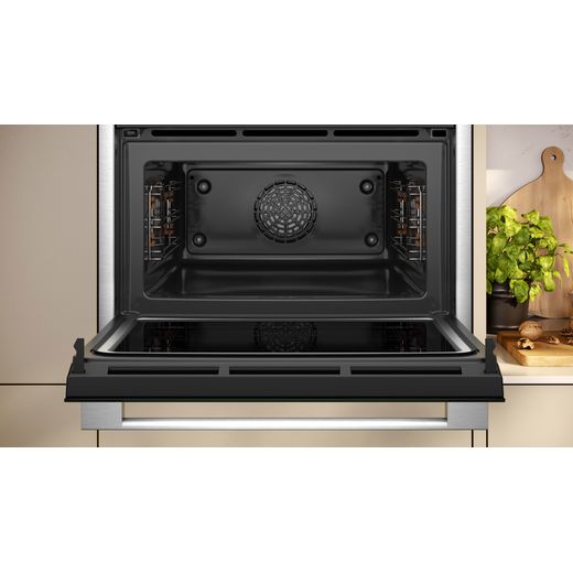NEFF Compact Electric Single Oven - Black / Stainless Steel - Oven in kitchen with door open shot