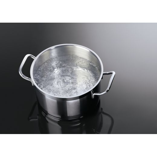 AEG SurroundCook Electric Cooker with - Black - Pan on hob shot