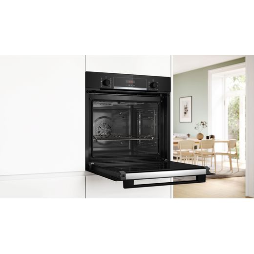 Bosch Series 4 Built In Electric Single Oven - Black - Oven with door open in kitchen shot