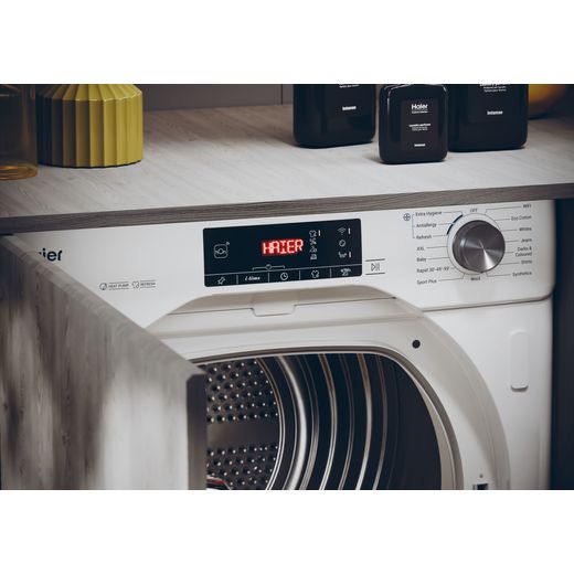Haier 31900541 Integrated Heat Pump Tumble Dryer - White - Control panel closeup in laundry room