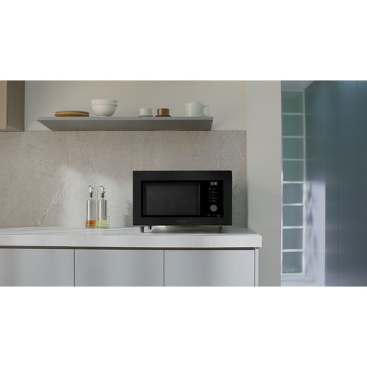 Samsung MC32DB7746KCE3 33cm tall, 52cm wide, Freestanding Microwave - Black - Microwave in kitchen shot