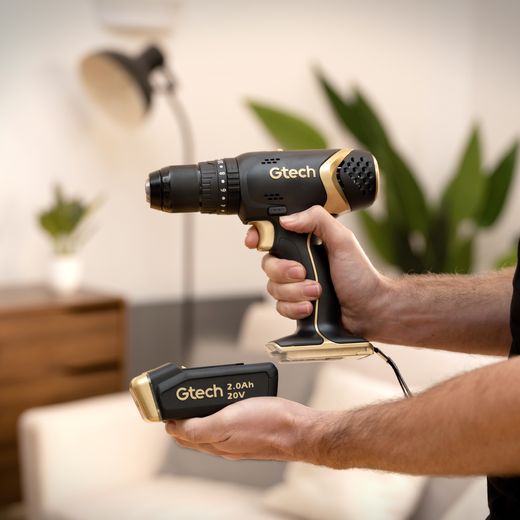 Gtech 1-12-028 Tool Black / Gold - Person holding drill shot