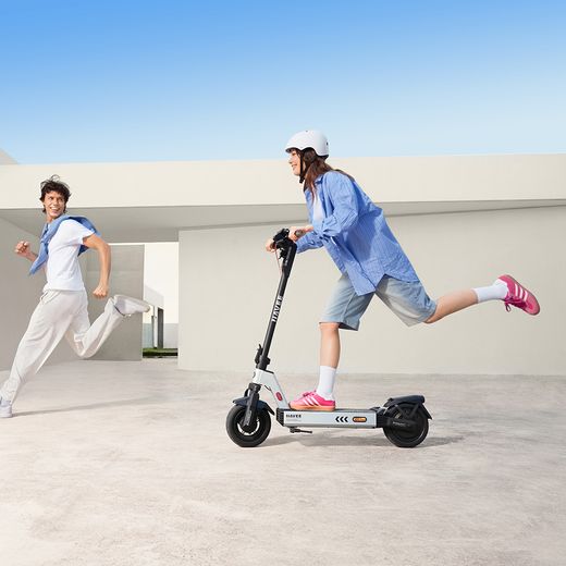 Navee Electric Scooter - people on scooter shot