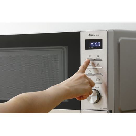 Panasonic NN-SD37QSBPQ Microwave Stainless Steel - Person pushing button