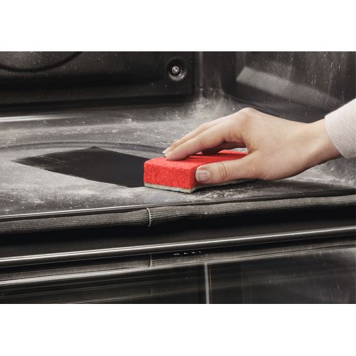 Oven - Person cleaning oven shot