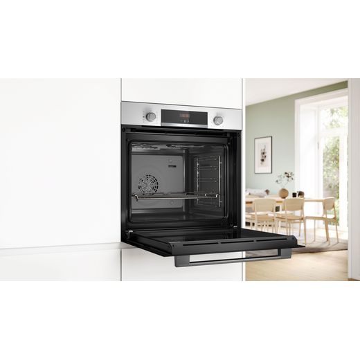 Bosch Series 4 Built In Electric Single Oven - White - Oven in kicthen with door open shot