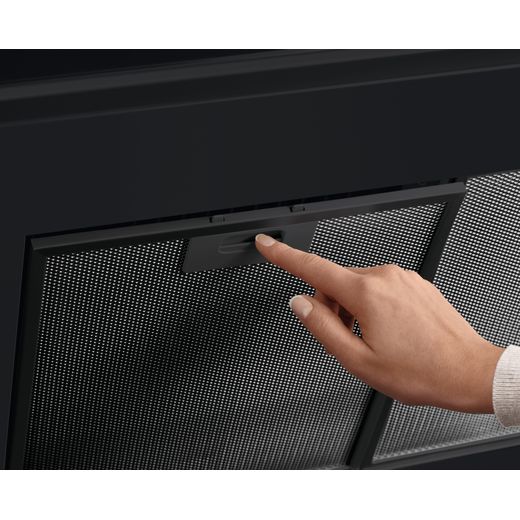 AEG 6000 ExtractionTech DBX3651R 60 cm Chimney Cooker Hood - Black - Person taking filter off shot