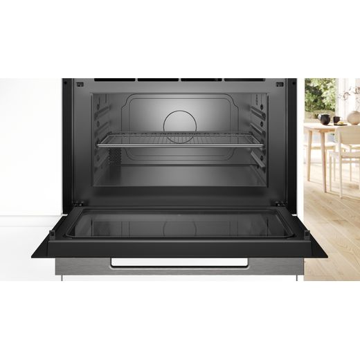 Bosch CEG732XB1B Built In MW only - Black - Close up of microwave in kitchen with door open shot