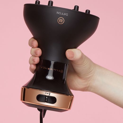Bellissima Italia Ceramic Diffon Diffuser BEL11887 Hot Air Styler - Black - Person holding diffuser shot