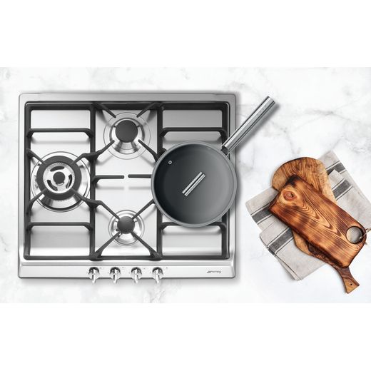 Smeg Cucina SR60GHS 60cm Gas Hob - Stainless Steel - Hob sat in marble workstop with a pan on one of its burners