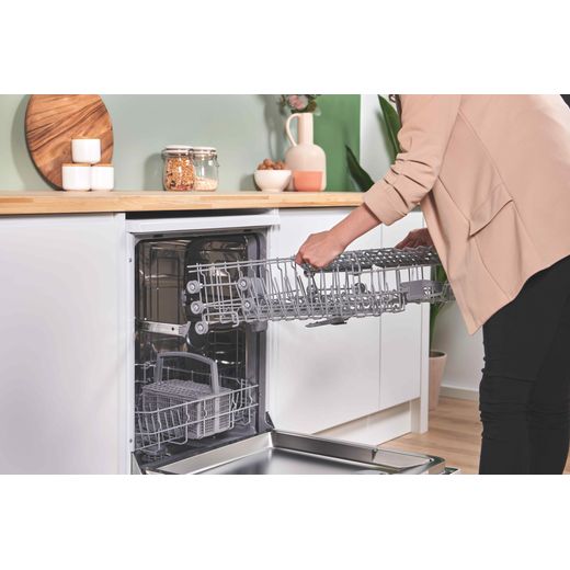 Bosch Series 2 Standard Dishwasher - White - Woman adjusting backet