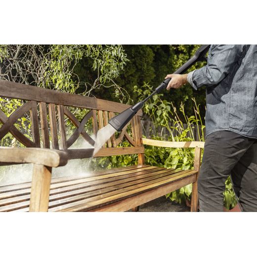 Kärcher K 3 eco!Booster Pressure Washer - Man cleaning bench