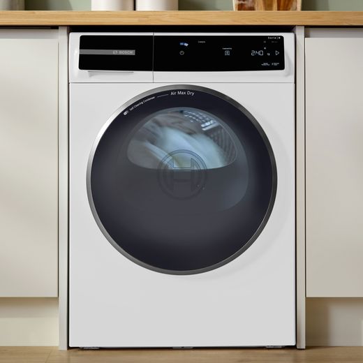 Bosch Series 8 WRB247C9GB 9Kg Heat Pump Tumble Dryer - White - machine in kitchen shot
