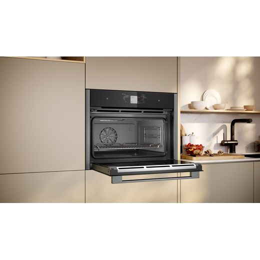 NEFF Compact Electric Single Oven - Graphite Grey - Oven in kitchen with door open shot