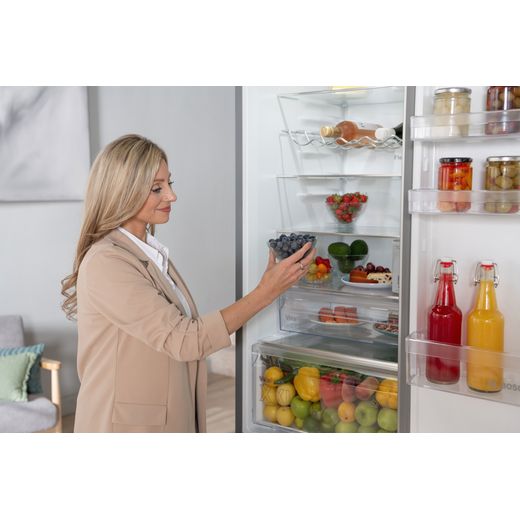 Bosch Series 4 KGN392LAGG 203cm 70/30 Fridge Freezer - Stainless Steel Effect - women in fridge shot