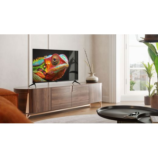 Sharp HJ4225K 43" 4K Ultra HD Smart Roku TV - tv in living room shot