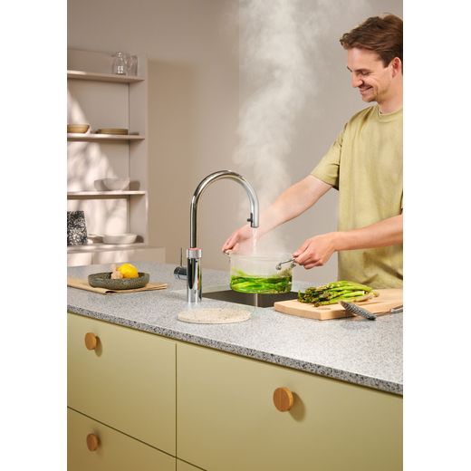 Quooker FXRCHRBUN1 Boiling Water Tap Chrome - person using tap shot shot