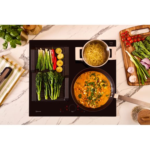NEFF N70 T56FHS1L0 59cm Induction Hob - Black - top view hob cooking food shot
