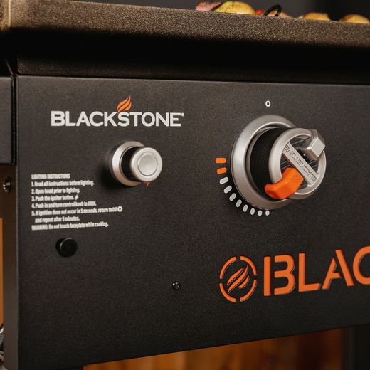 Blackstone 28in Griddle with Hood Gas Barbecue - Black - Close up control shot