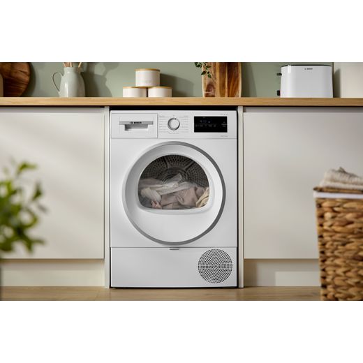 Bosch Series 4 WTH85226GB 8Kg Heat Pump Tumble Dryer - White  - washing machine in kitchen shot
